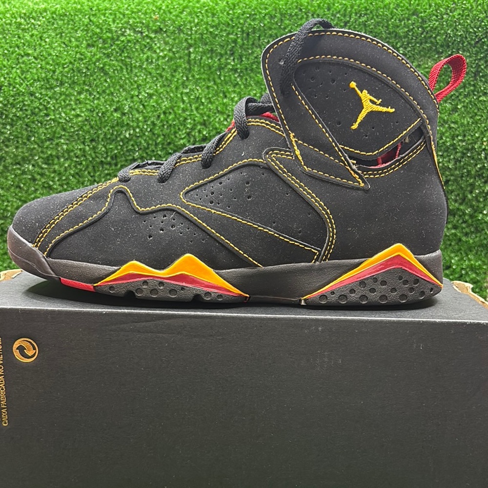 Jordan Black and Orange Sneakers with Geometric Design
